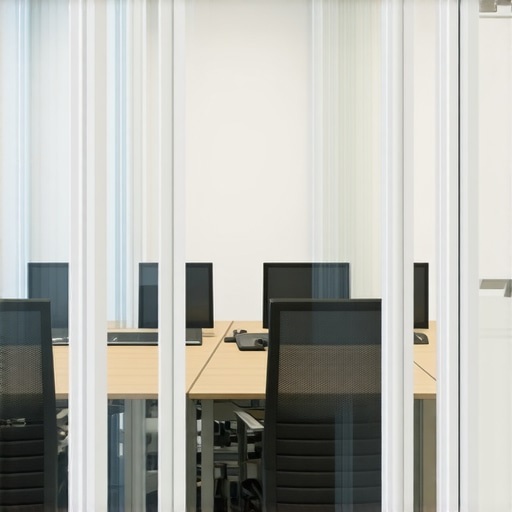 A modern conference room with glass walls showing glare and potential for distractions.